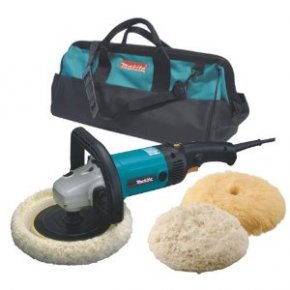 A photo of a Makita angle grinder with buffing accesories.